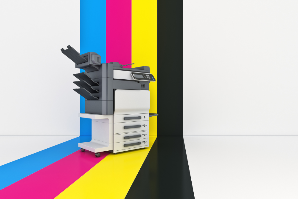 Color multifunction printer with CMYK swatches behind it.